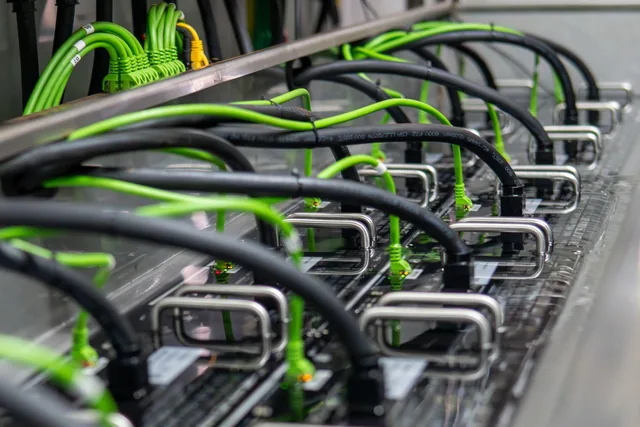 Servers running in immersion cooling tanks